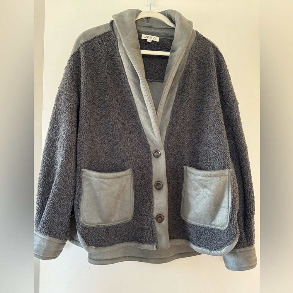Gray Faux suede and Sherpa button up jacket. Runs roomy Size large. By Listicle